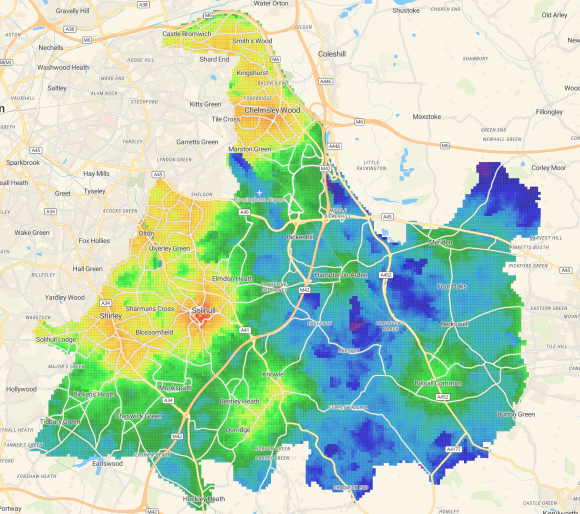 A colour-coded map displaying weather radar data across an urban and suburban area. The map shows a concentration of red and yellow areas indicating higher rainfall intensity around Solihull, with green and blue areas representing moderate to light rain. Major roads and town names are visible for geographic reference.